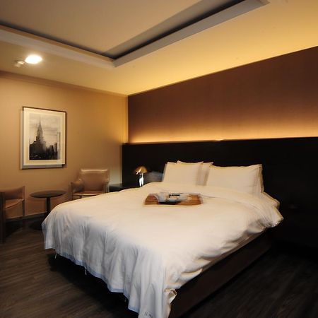 Hotel Tate Suwon Bagian luar foto